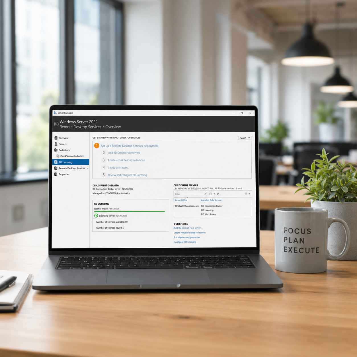Laptop on a desk with aWindows Server 2022 Remote Desktop Services Overview setting.