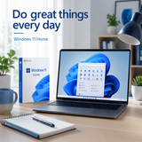 Laptop on a desk with Windows 11 Home packaging, featuring the text 'Do great things every day'.