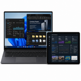 Laptop and tablet displaying software interfaces 